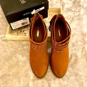NWT BCBGeneration Camel with Soft Goat
Braided Ankle Boots
(NWT
$55